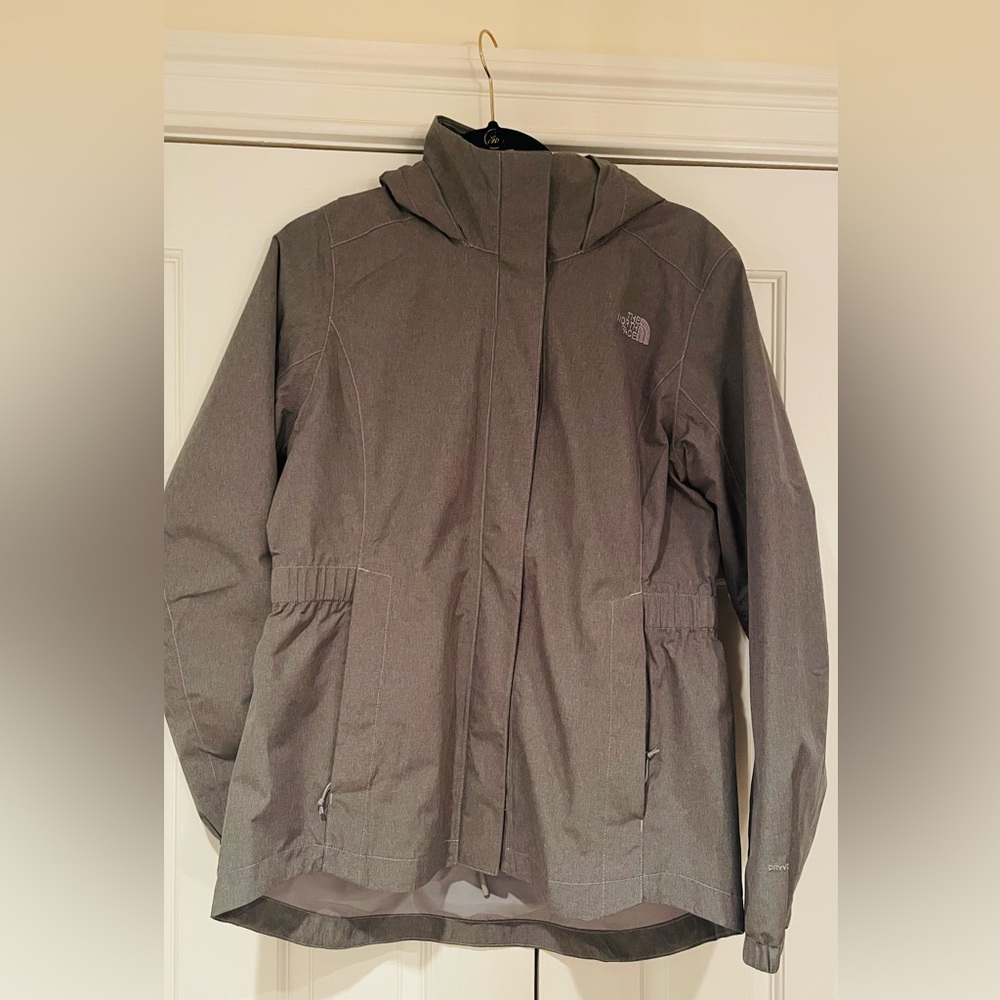 New w/o tags.  Raincoat. Never worn too small for me.